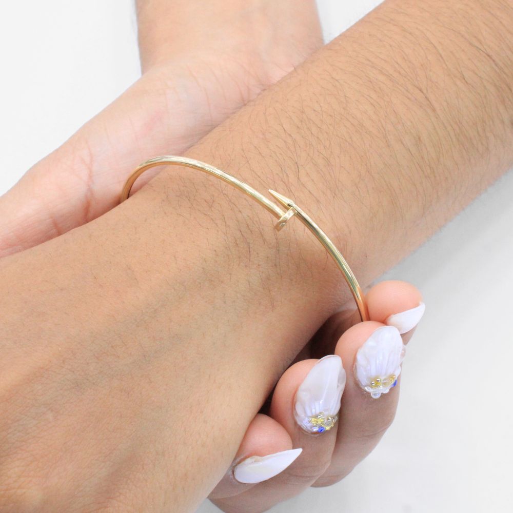 Aro de Oro 14k Tubular Hueco con Forma de Clavo Brillante mod. 1163