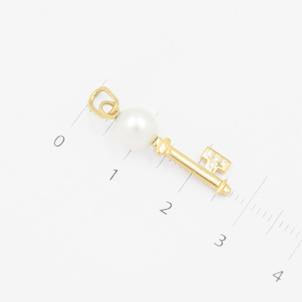 Dije de Oro 14k con Diseño de Llave con Incrustación de Perla mod. 9125