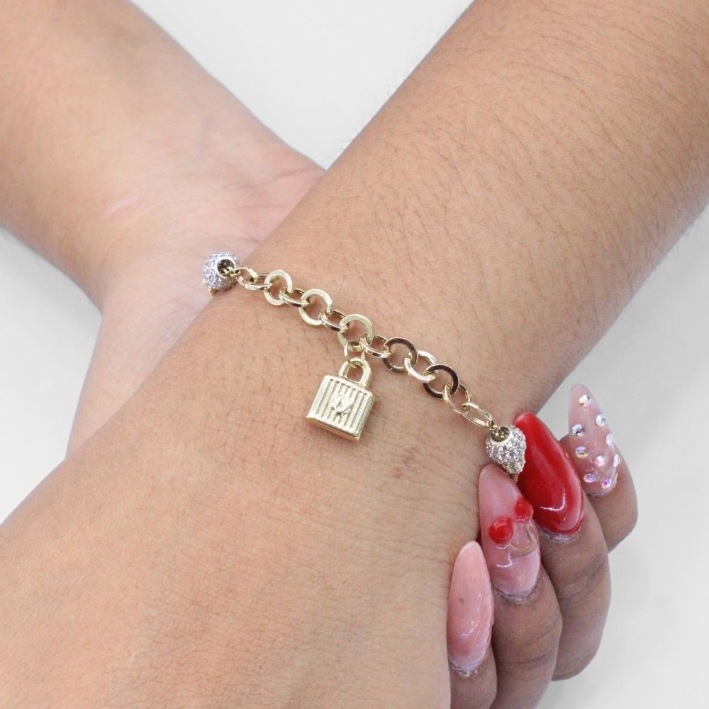 Pulsera de Oro 14k Diseño Especial con Esferas de Zirconias y Charm de Candado mod. 9694
