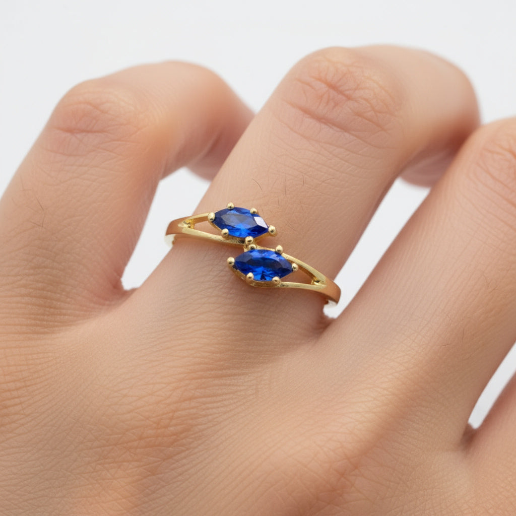 Anillo de Oro 14k Diseño Cruzado con Zirconias Color Azul Zafiro mod. 10011