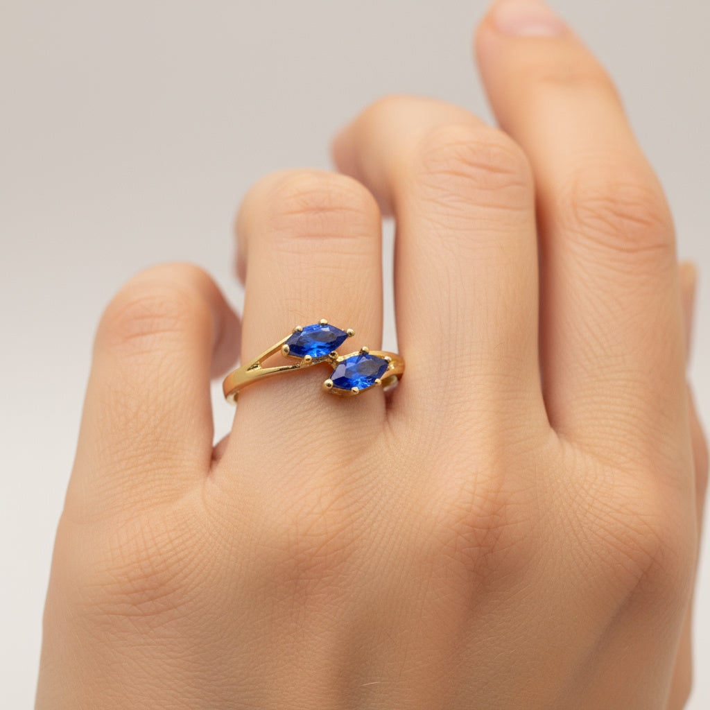 Anillo de Oro 14k Diseño Cruzado con Zirconias Color Azul Zafiro mod. 10011