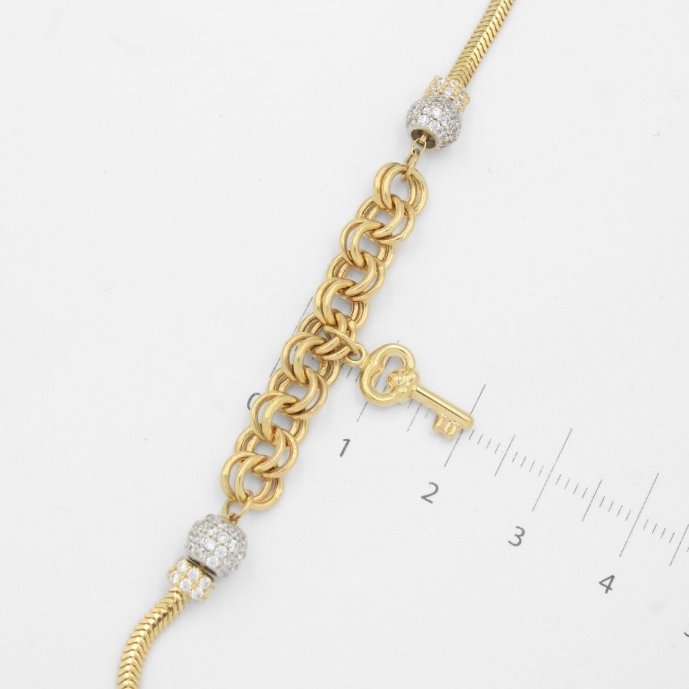 Pulsera de Oro 14k Diseño Especial con Esferas de Zirconia y Charm de Llave Brillante mod. 9689