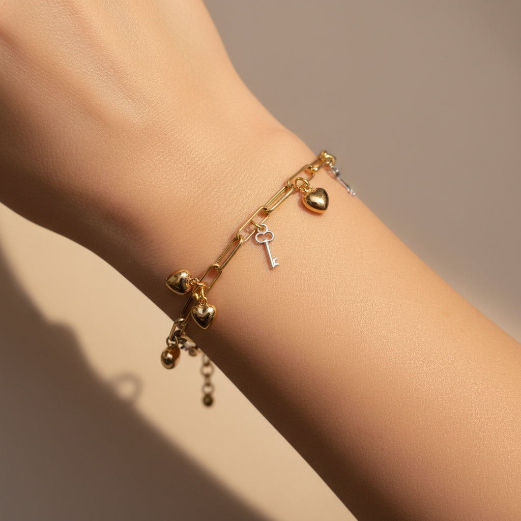 Pulsera de Oro 14k Diseño Hueco y fino con Dijes de Corazón y Llaves mod. 10017