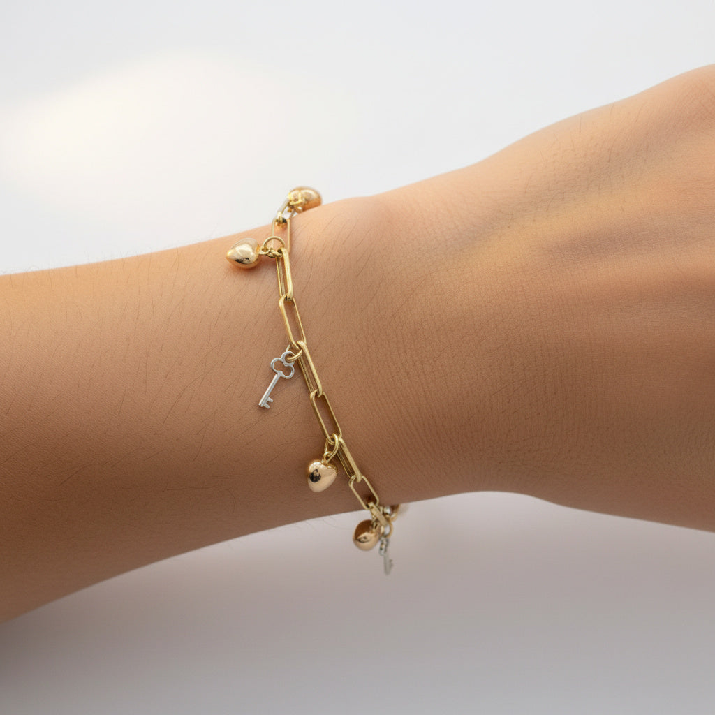 Pulsera de Oro 14k Diseño Hueco y fino con Dijes de Corazón y Llaves mod. 10017
