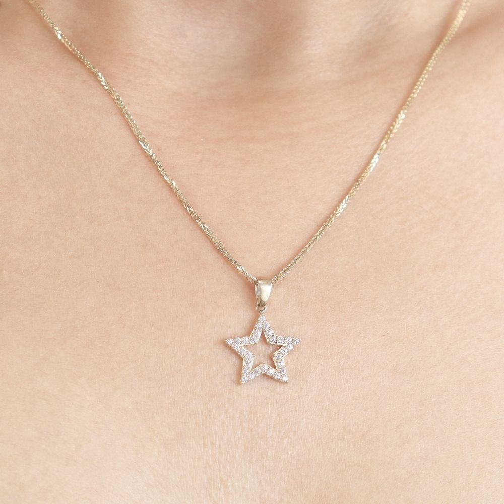 Dije de Oro 14K de Silueta de Estrella con Zirconias mod. 6895