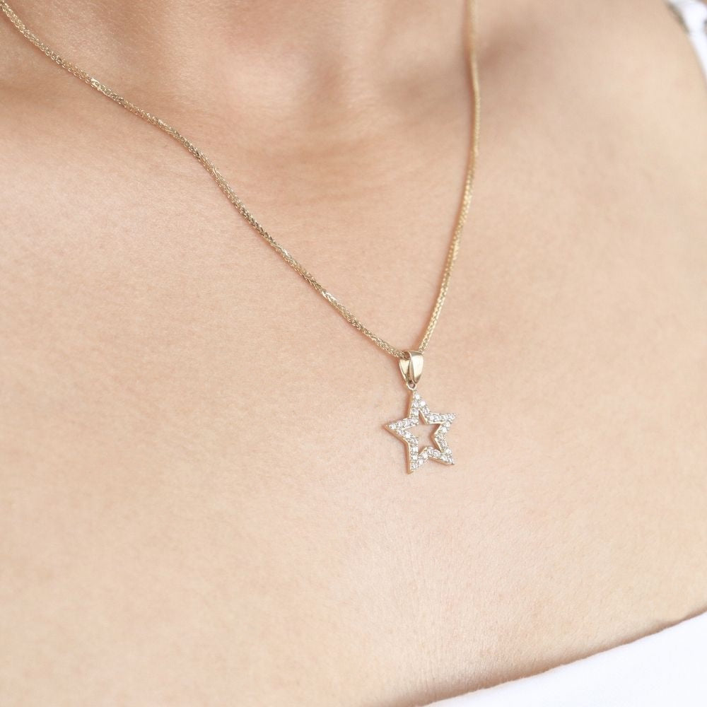 Dije de Oro 14K de Silueta de Estrella con Zirconias mod. 6895
