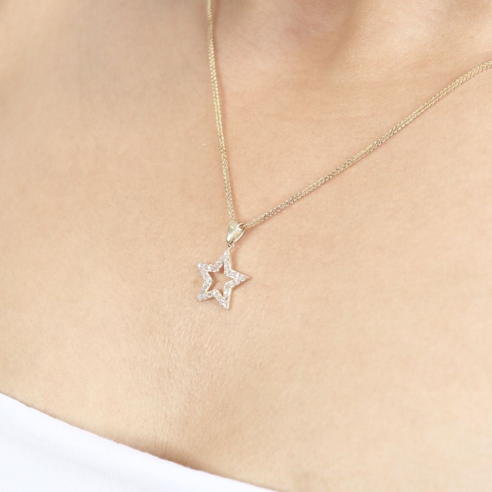 Dije de Oro 14K de Silueta de Estrella con Zirconias mod. 6895