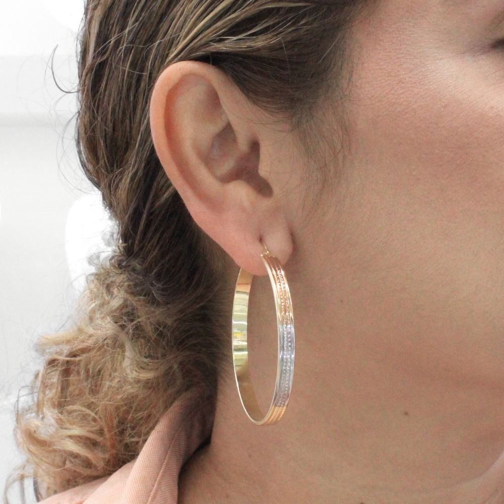 Arracada de Oro 14k Diseño Especial Redondo y Hueco en Líneas con Diamantado Central mod. 9777