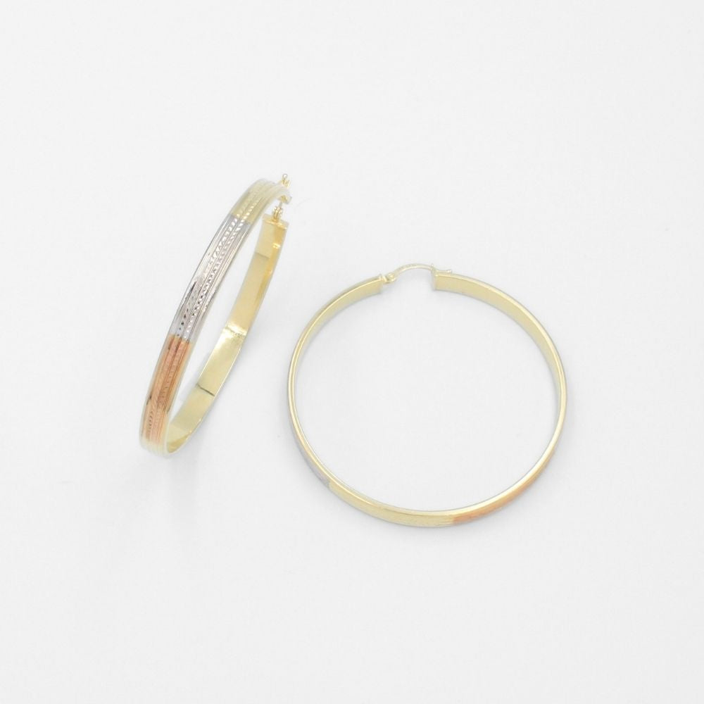 Arracada de Oro 14k Diseño Especial Redondo y Hueco en Líneas con Diamantado Central mod. 9777