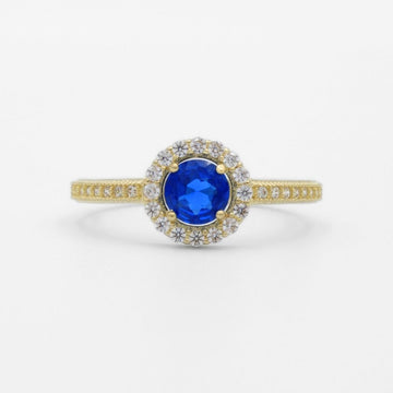 Anillo de Oro 14k Diseño Elegante con Zirconia de Corte Redondo e Incrustación de Zirconias Finas mod. 9731