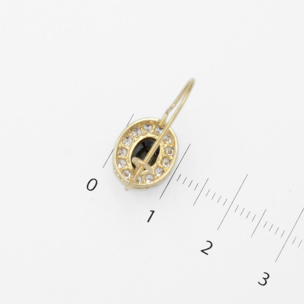 Arete con Broche Arillo de Oro 14k con Diseño Oval con Zirconia Negra Detallada con Zirconias en Bisel mod. 9763