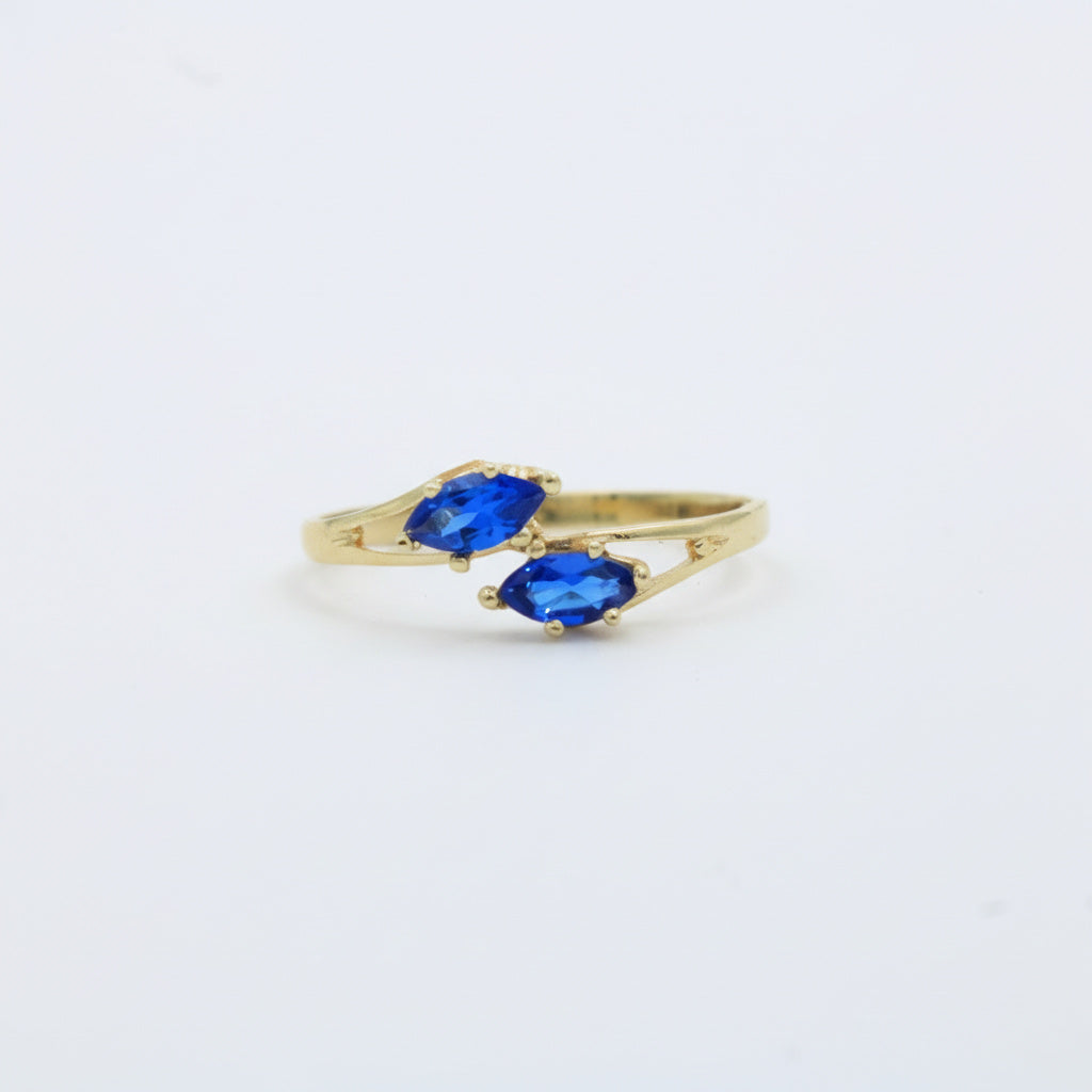 Anillo de Oro 14k Diseño Cruzado con Zirconias Color Azul Zafiro mod. 10011