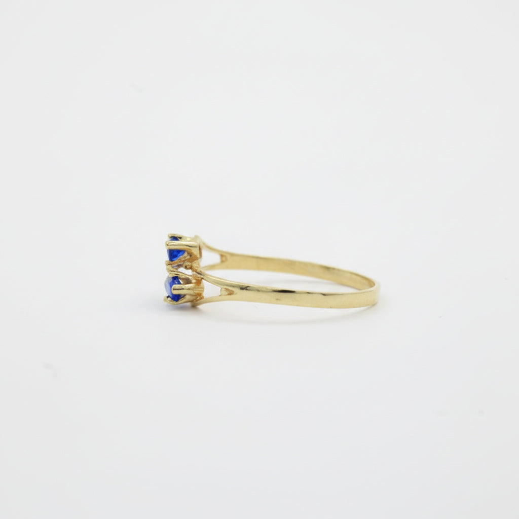 Anillo de Oro 14k Diseño Cruzado con Zirconias Color Azul Zafiro mod. 10011