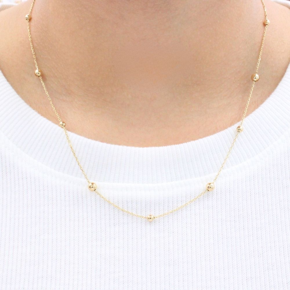 Gargantilla de Oro 14k Elegante con Esferas Lisas y Brillantes de Diseño Hueco mod. 9343