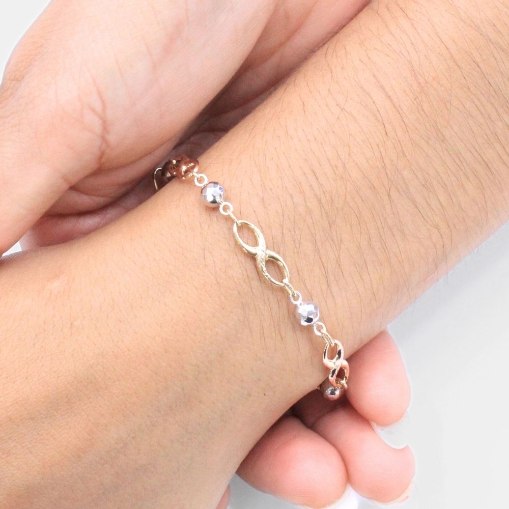 Pulsera de Oro 14k Diseño de Infinitos con Esferas Diamantadas mod. 9327