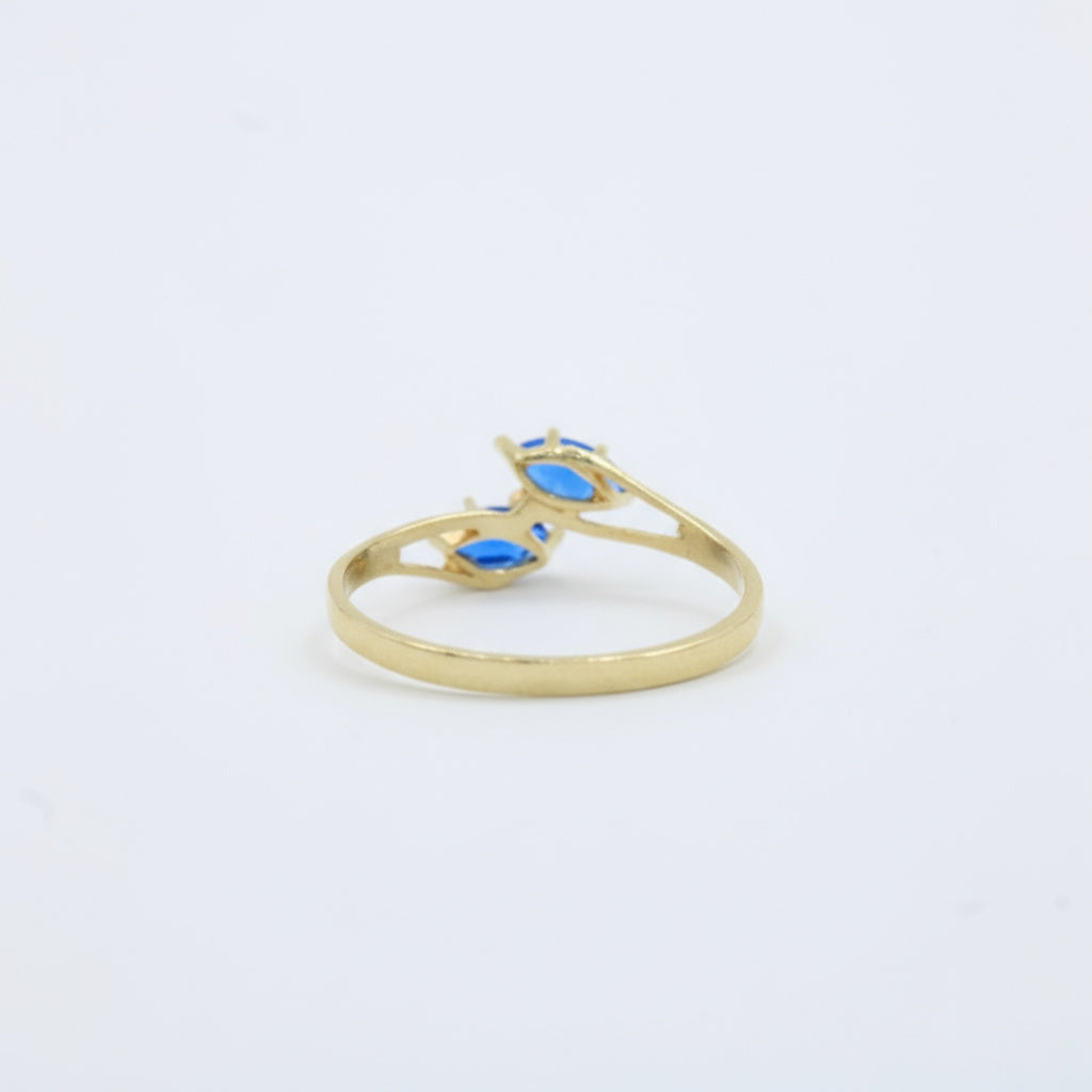 Anillo de Oro 14k Diseño Cruzado con Zirconias Color Azul Zafiro mod. 10011
