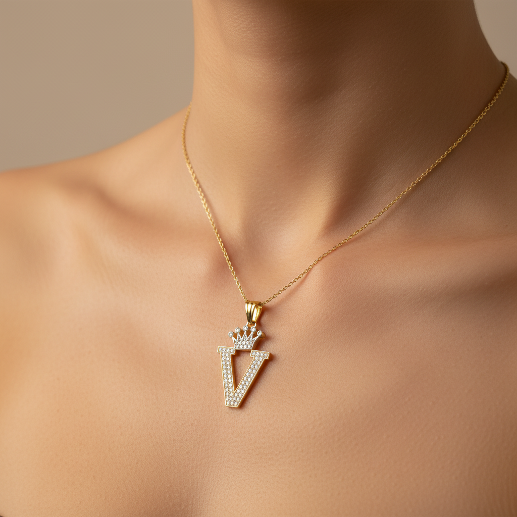Dije de Oro 14k con Diseño de Inicial V Incrustada con Zirconias mod. 10096
