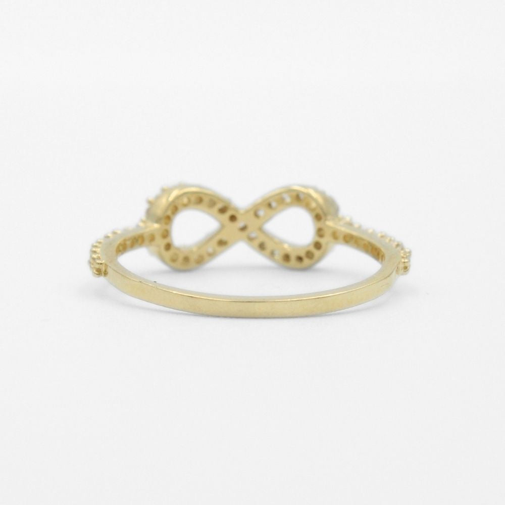 Anillo de Oro 14k Diseño en Forma de Infinito Incrustado con Zirconias de Corte Fino mod. 9736