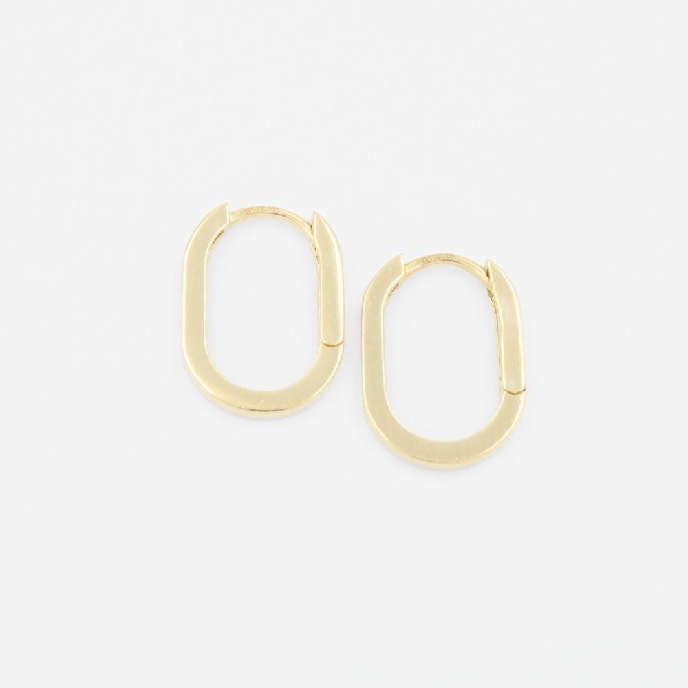 Grapa de Oro 14k Hueca de Diseño Oval con una Línea de Zirconias mod. 9265