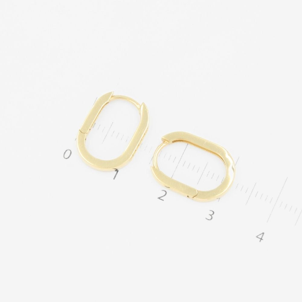 Grapa de Oro 14k Hueca de Diseño Oval con una Línea de Zirconias mod. 9265