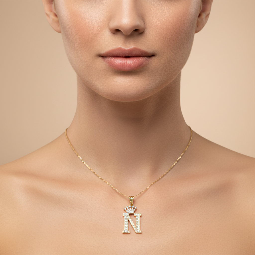 Dije de Oro 14k con Diseño de Inicial N Incrustada con Zirconias mod. 10103