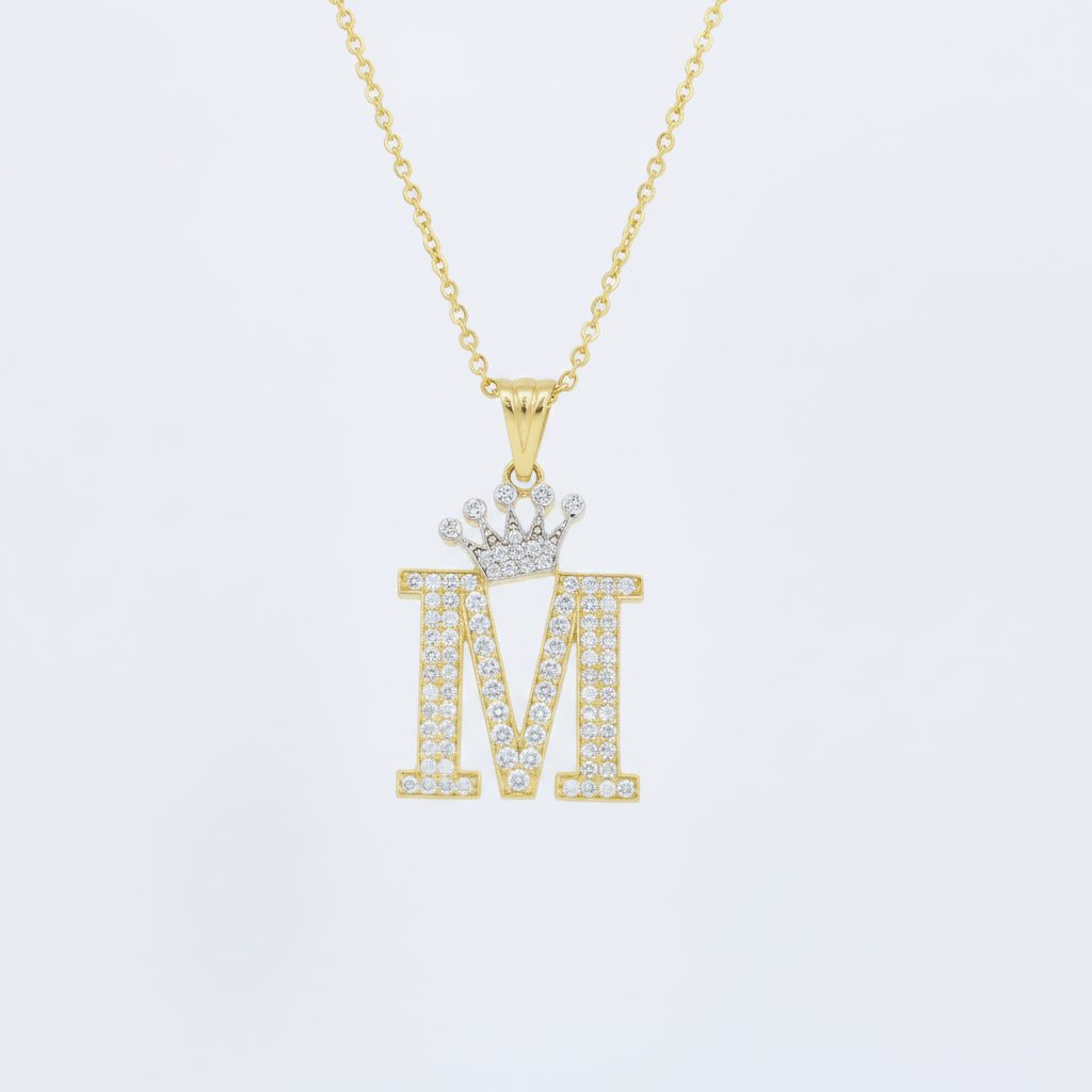 Dije de Oro 14k con Diseño de Inicial M Incrustada con Zirconias mod. 10104