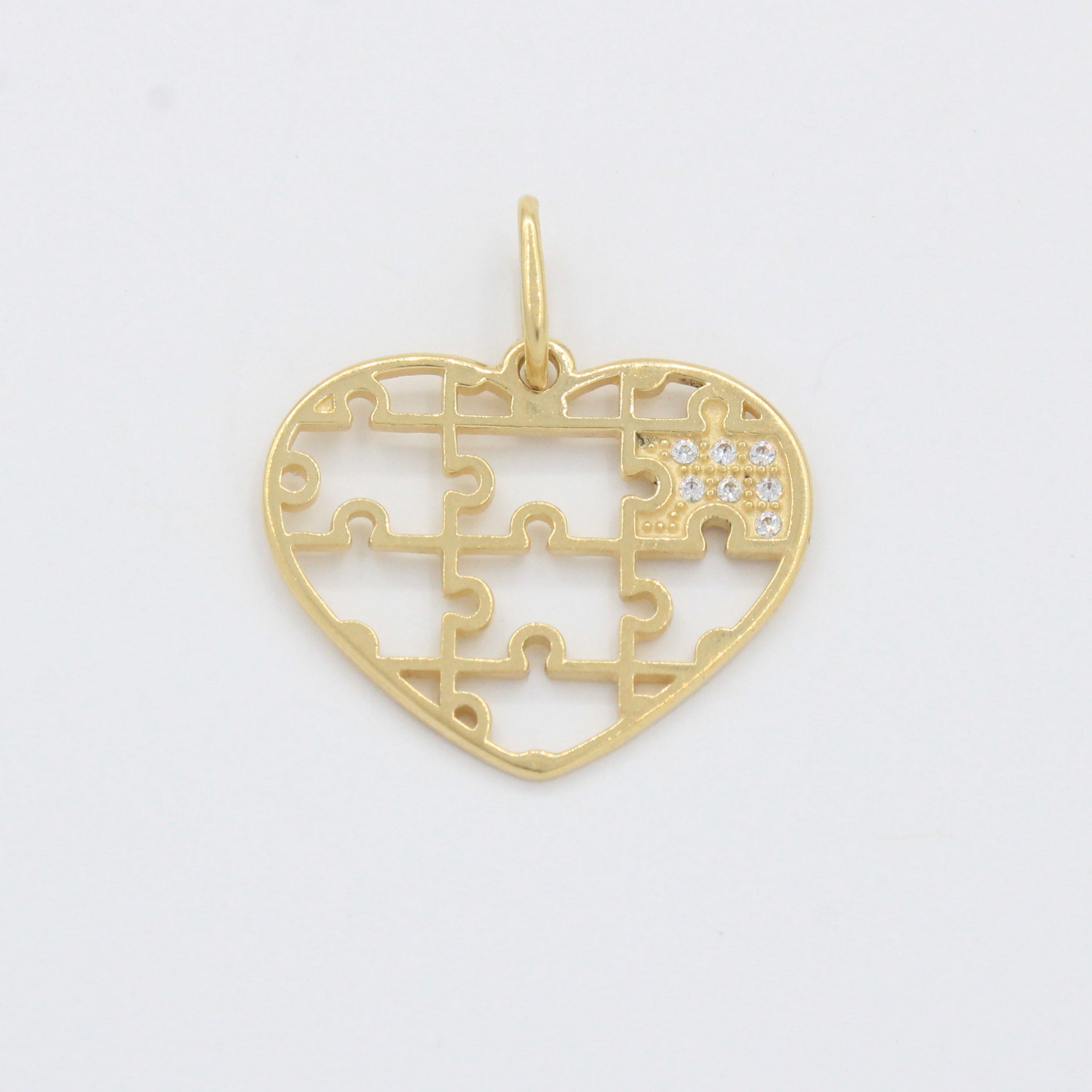 Dije de Oro 14k Corazón Rompecabeza con Pieza de Zirconias Finas mod. 10515