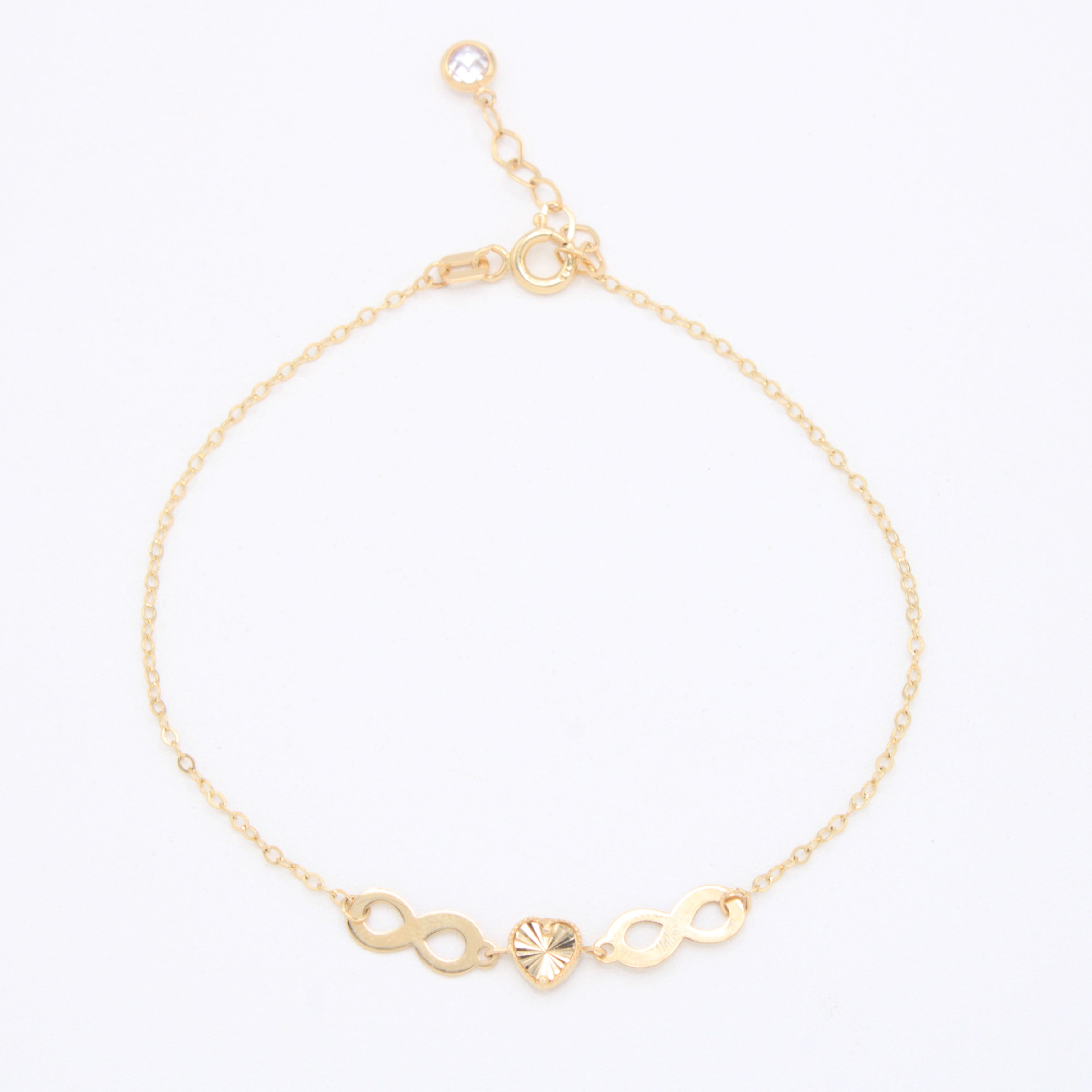 Pulsera de Oro 14k con Infinitos y Corazón Diamantado mod. 10973