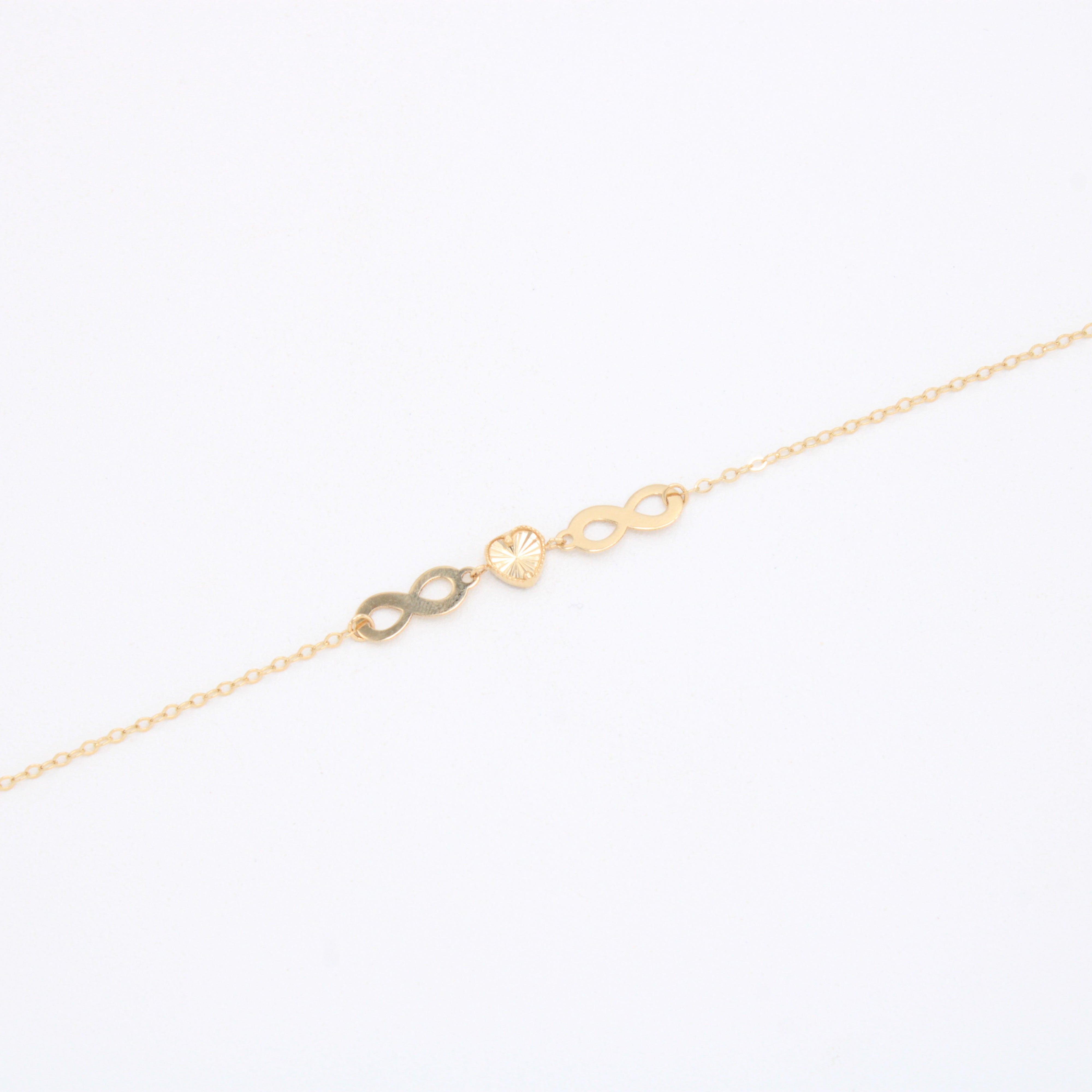 Pulsera de Oro 14k con Infinitos y Corazón Diamantado mod. 10973