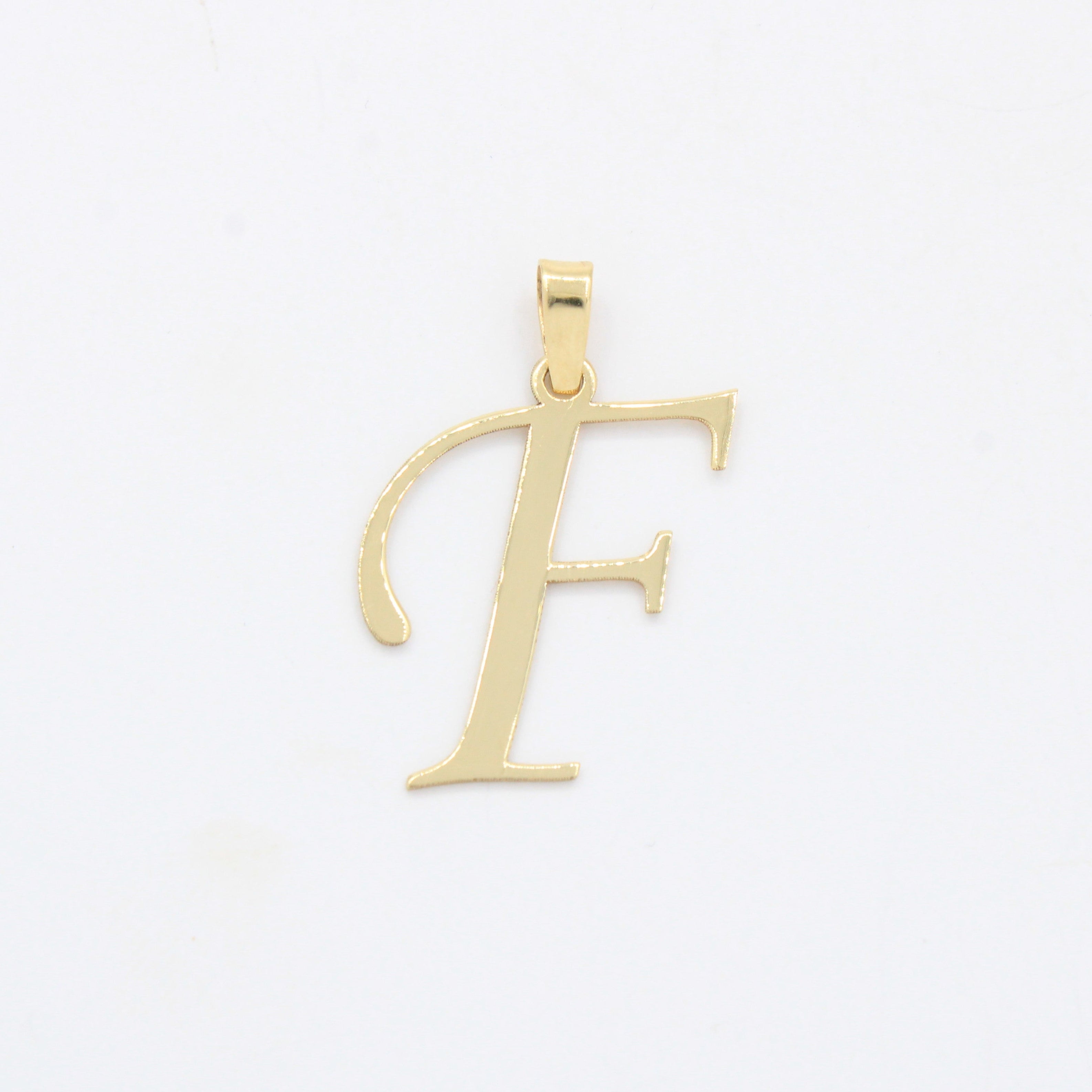 Dije de Oro 14k Modelo de Inicial F Estilo Cursiva Lisa y Brillante mod. 10552