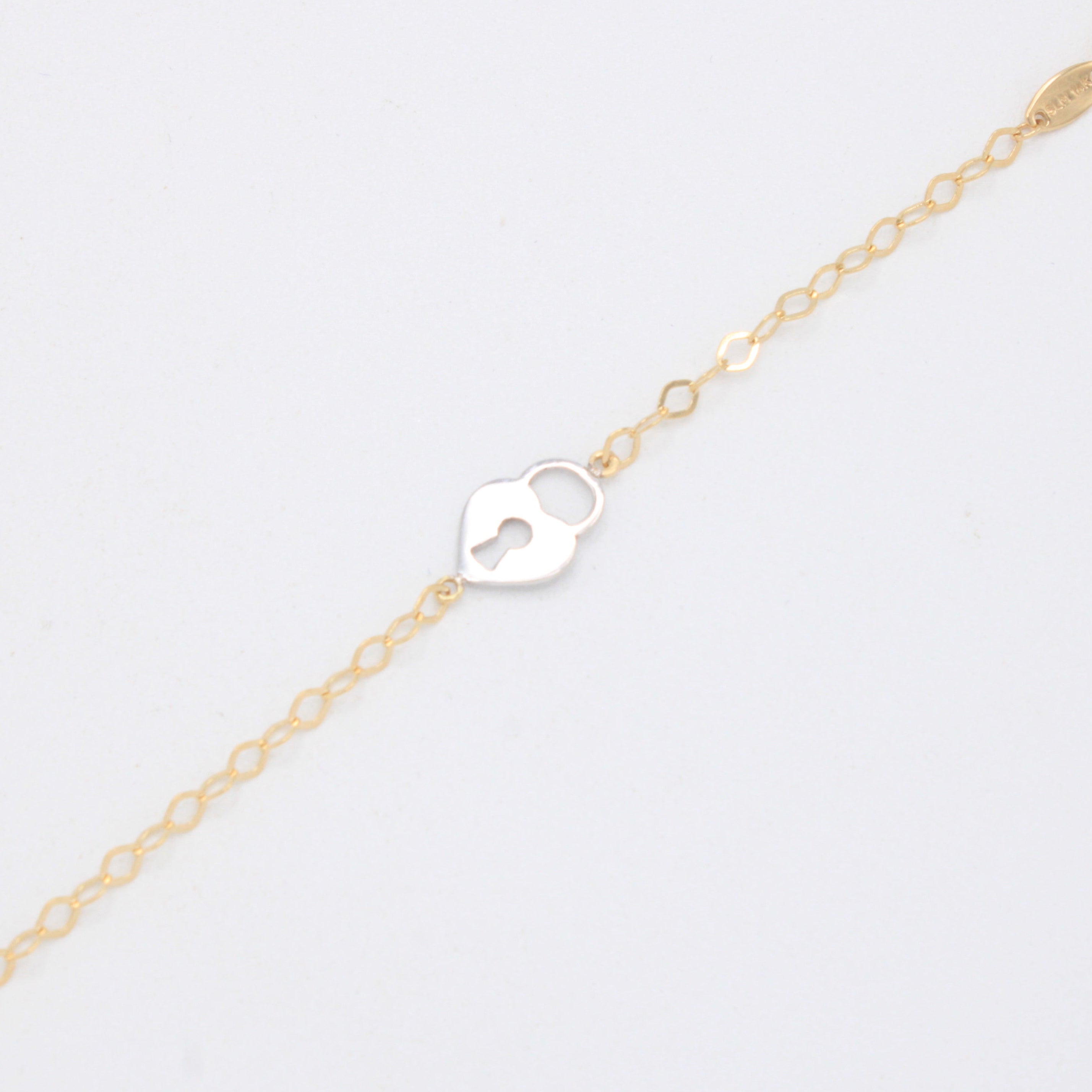Pulsera de Oro 14k Candado de Corazón en Oro Blanco mod. 11047
