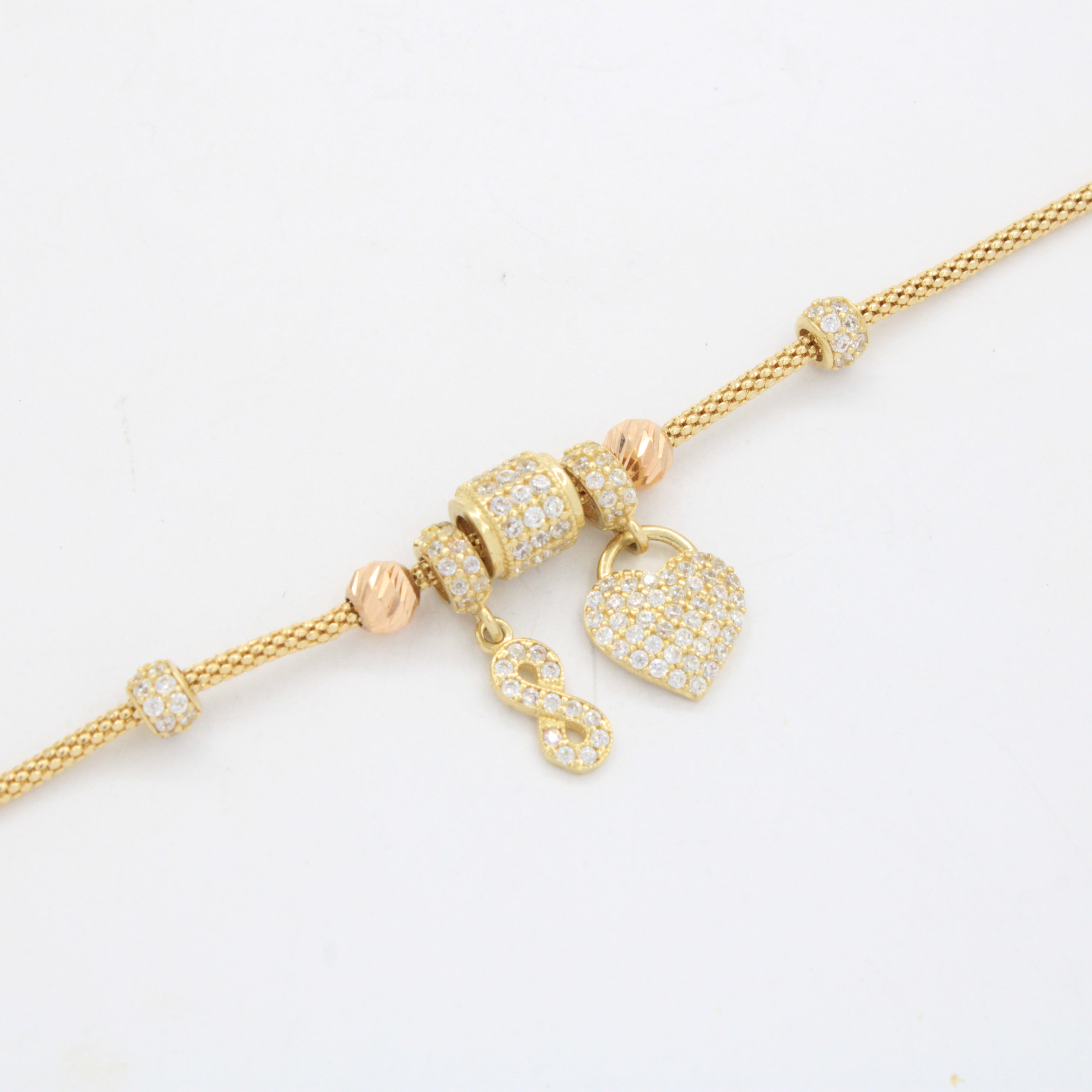 Pulsera de Oro 14k Tejido Cola de Rata con Dijes Charm, Diamantado y Zirconias mod. 10658