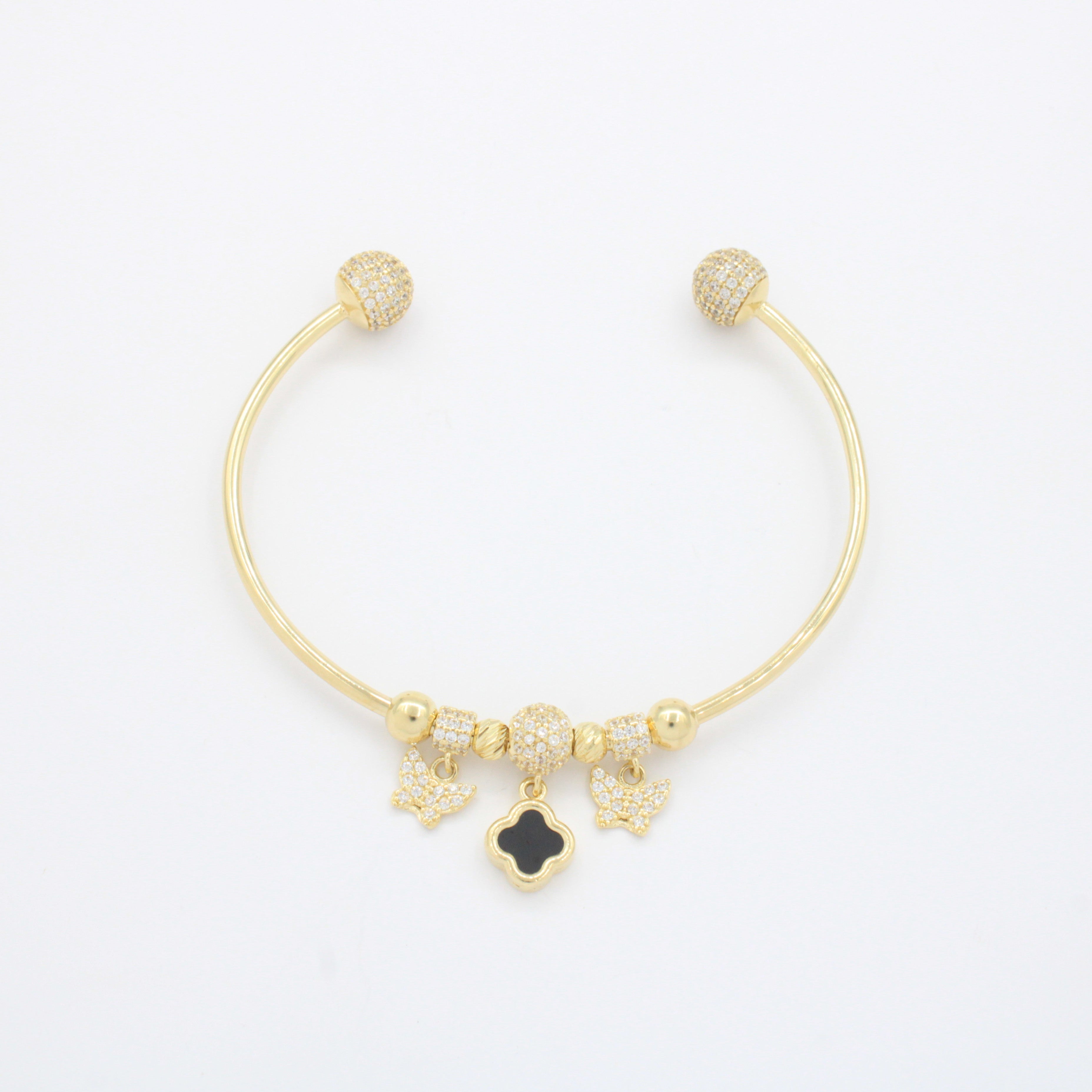 Pulsera de Oro 14k Tubular Hueca de Diseño Abierto Detallado con Trébol, Charms y Zirconias mod. 10668