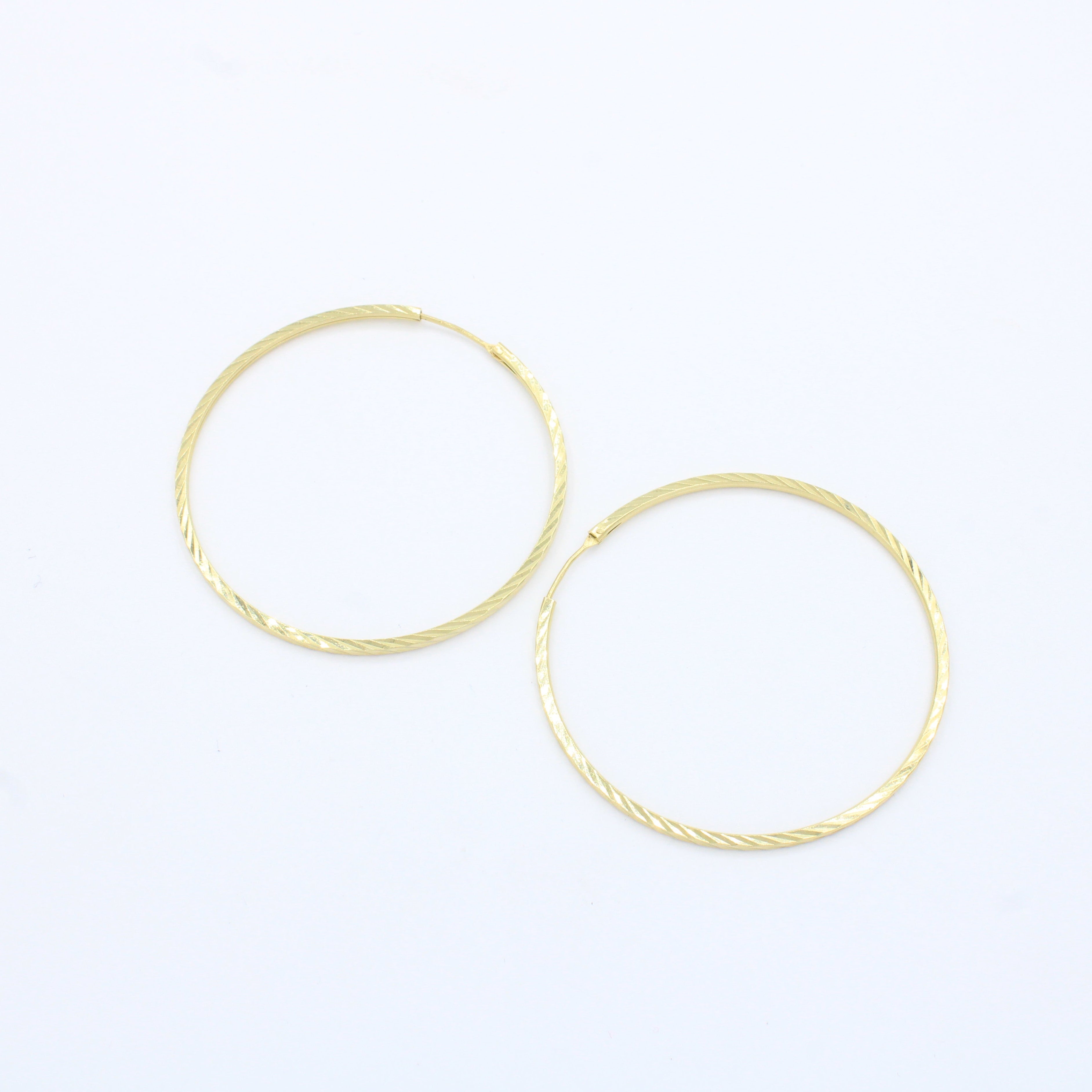 Arracada de Oro 14k con Diseño Redondo Hueco con Diamantado mod. 10146