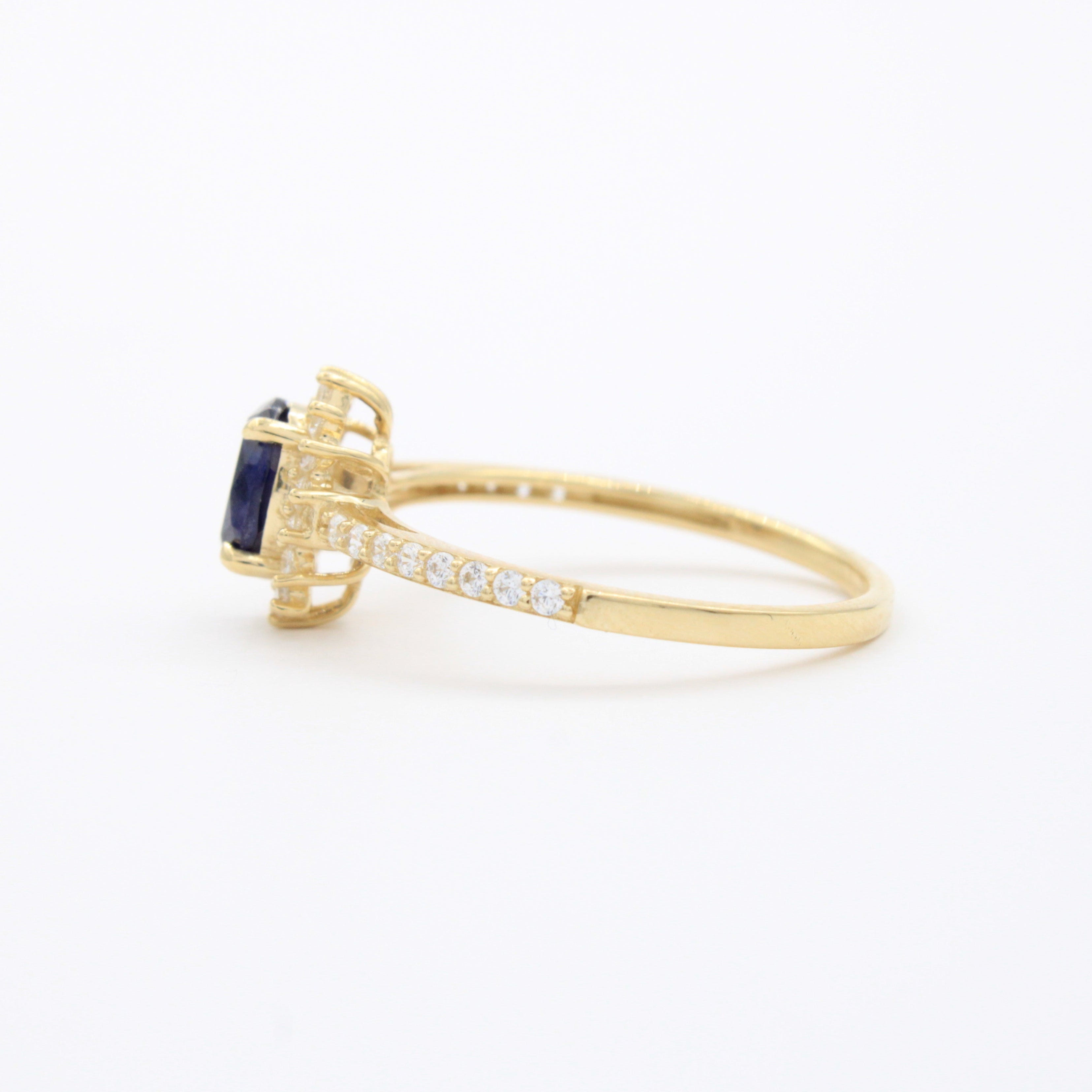 Anillo de Oro 14k Diseño Elegante con Zirconias Finas y Zirconia Color Azul Profundo mod. 10750