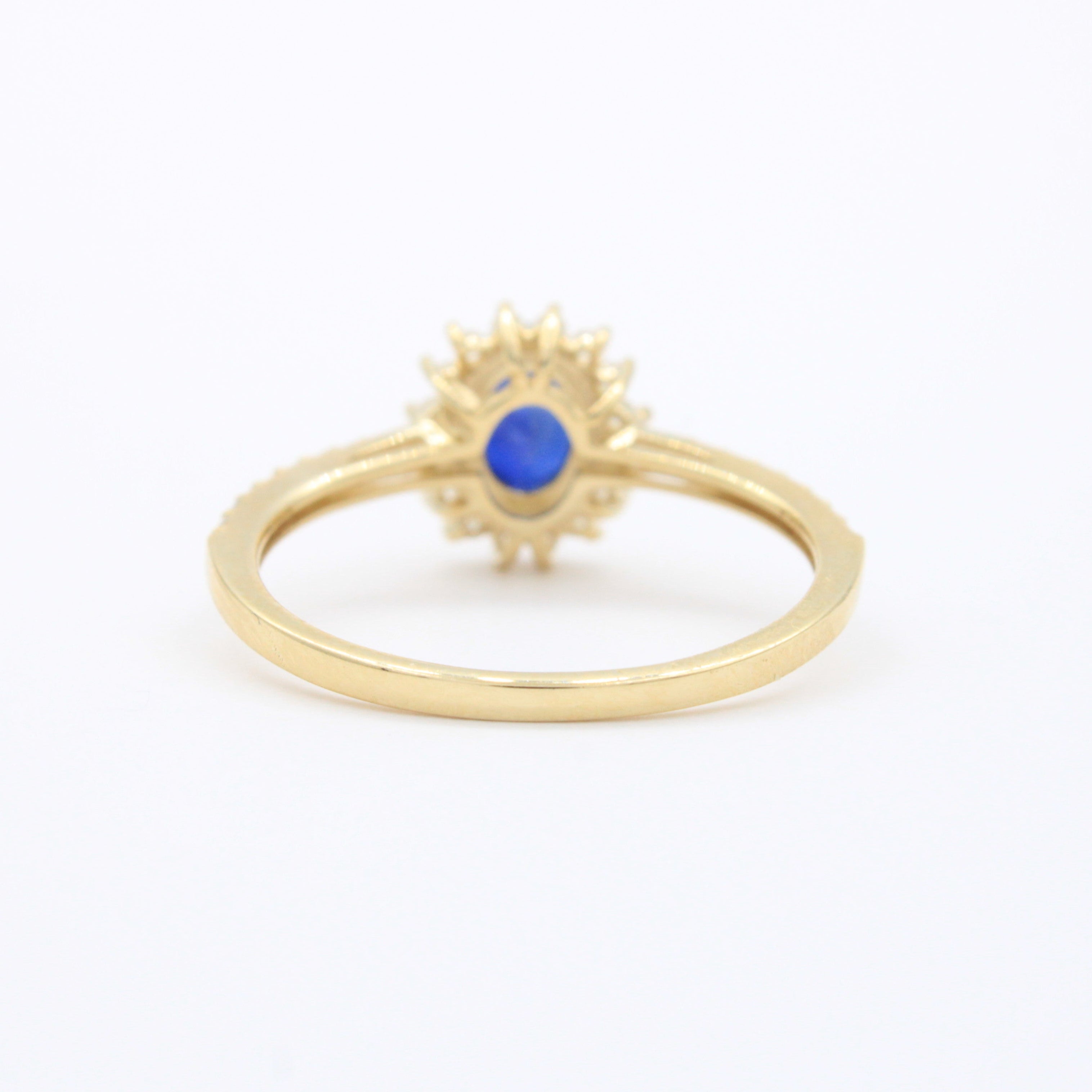 Anillo de Oro 14k Diseño Elegante con Zirconias Finas y Zirconia Color Azul Profundo mod. 10750