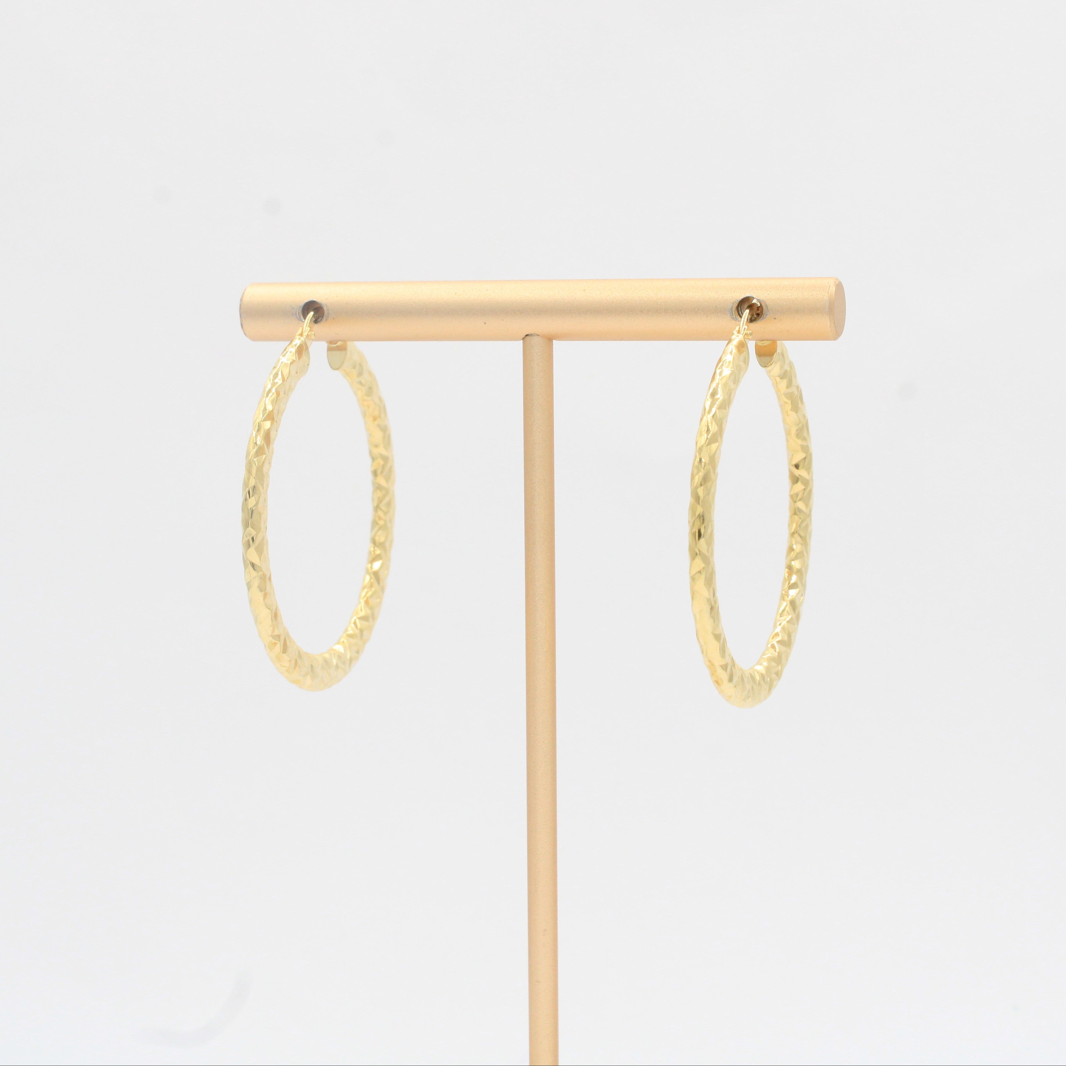 Arracada de Oro 14k Diseño Redondo Hueco Semi Plano con Diamantado mod. 10311