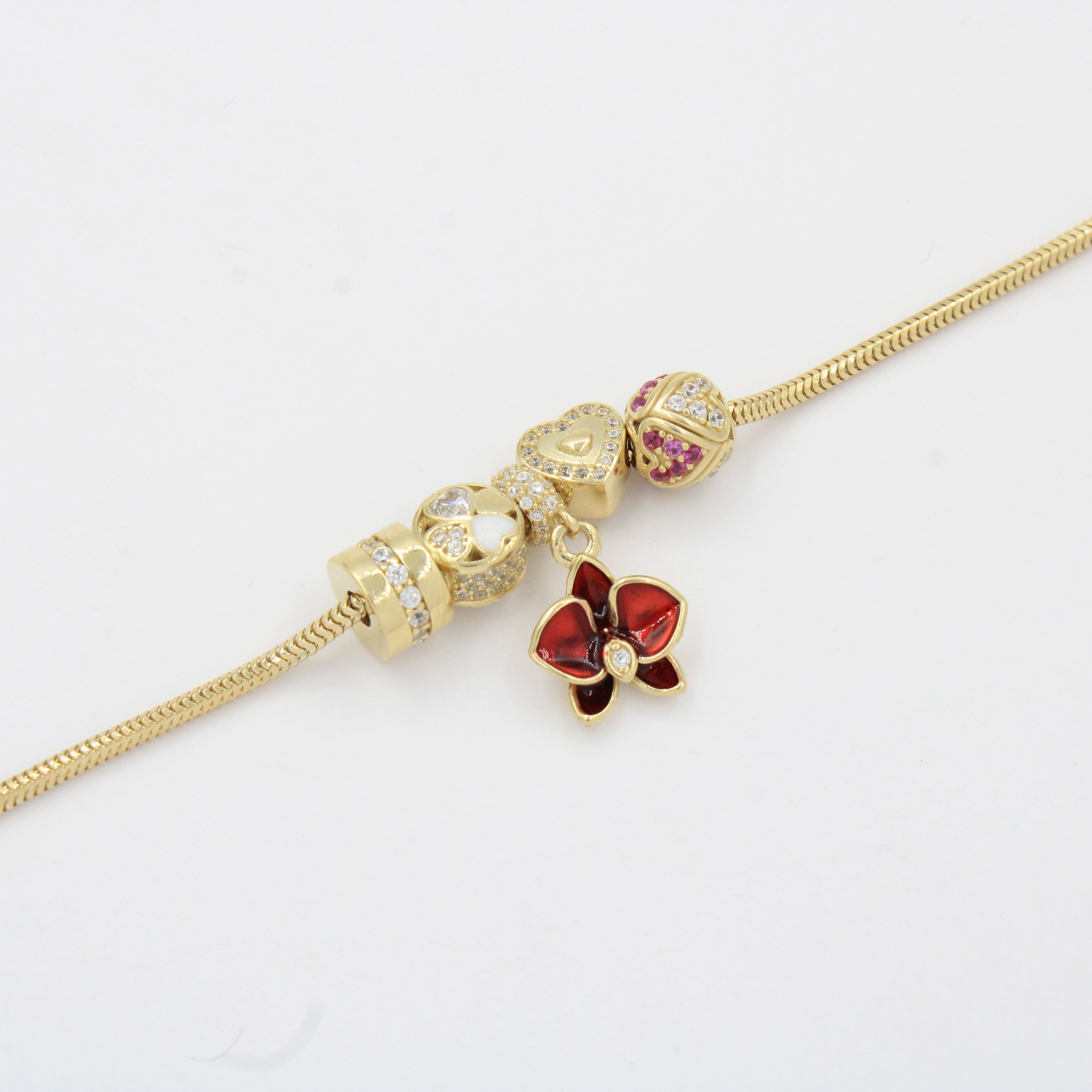 Pulsera de Oro 14k Tejido Cola de Rata con Dijes Charm Especiales con Zirconias mod. 10331