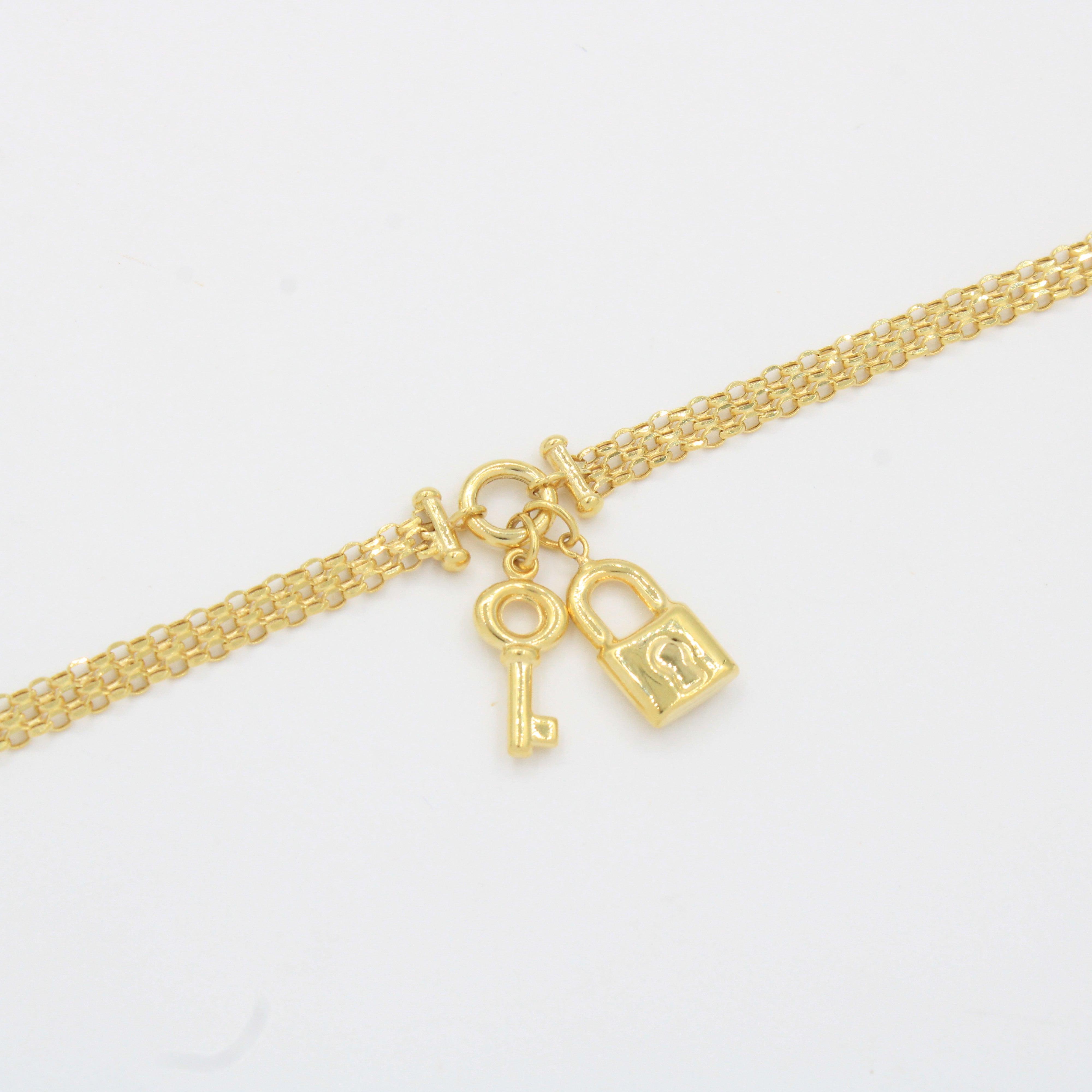 Pulsera de Oro 14k Tejido Fino y Ligero con Dijes de Llave y Candado mod. 10336