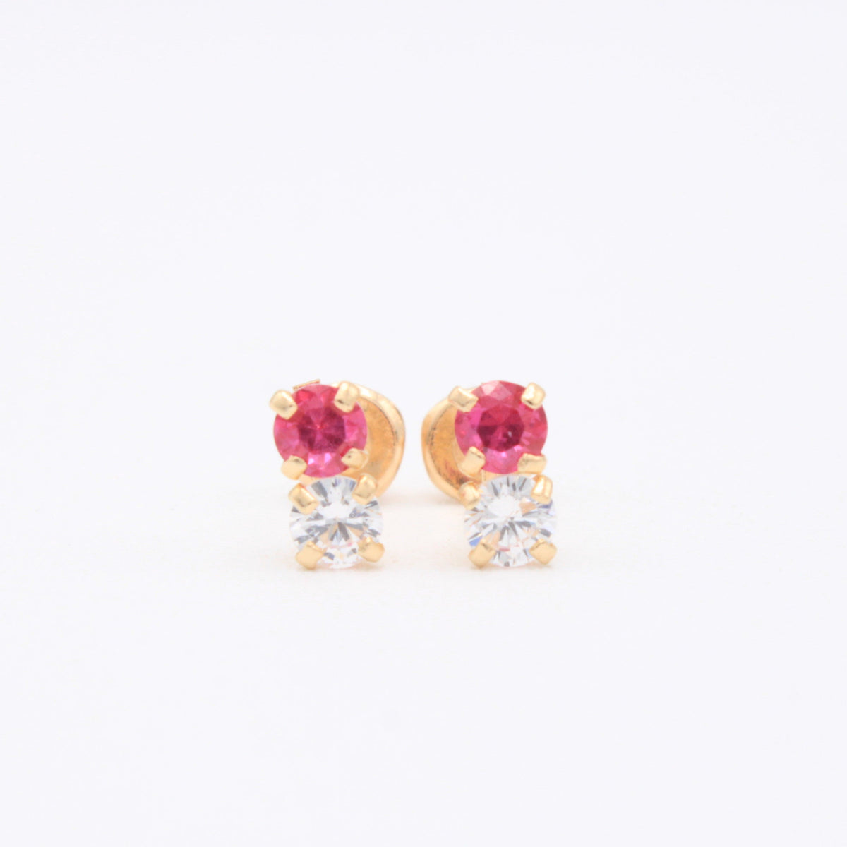 Broquel de Oro 14k Doble Zirconia con Zirconia Magenta Mod. 11158