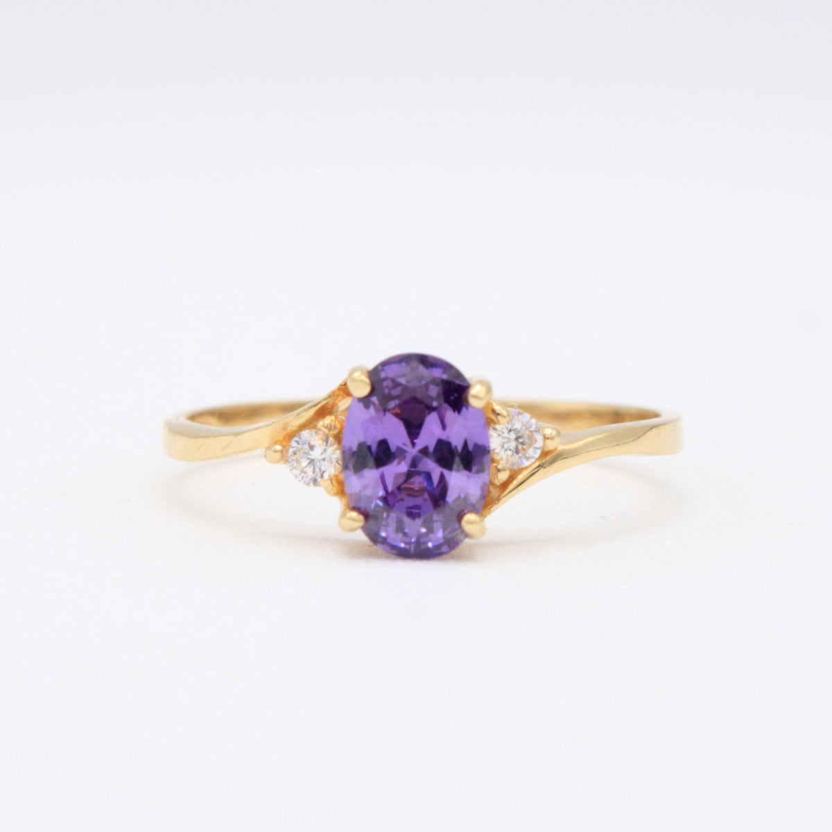 Anillo de Oro 14k Cruzado con Piedra Principal Morada mod. 11175
