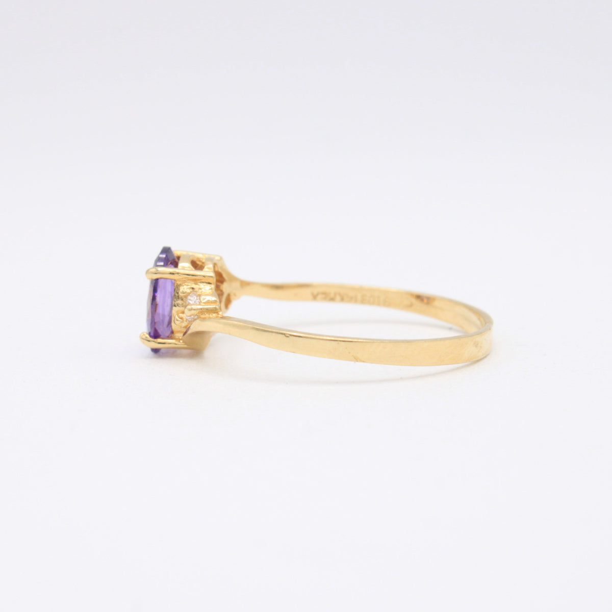 Anillo de Oro 14k Cruzado con Piedra Principal Morada mod. 11175