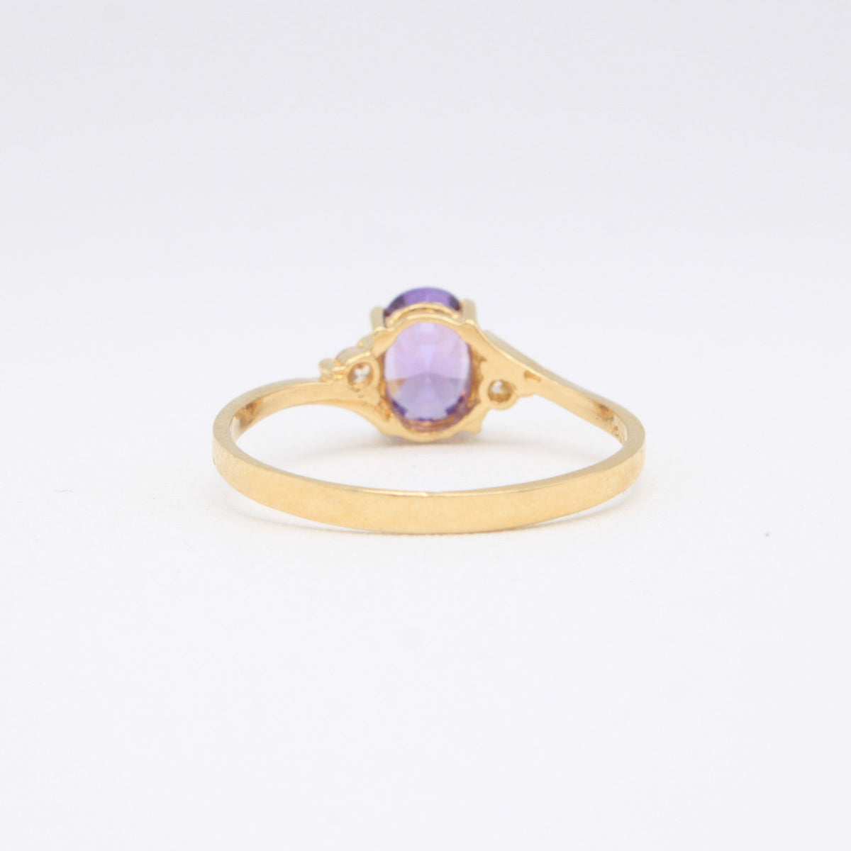 Anillo de Oro 14k Cruzado con Piedra Principal Morada mod. 11175