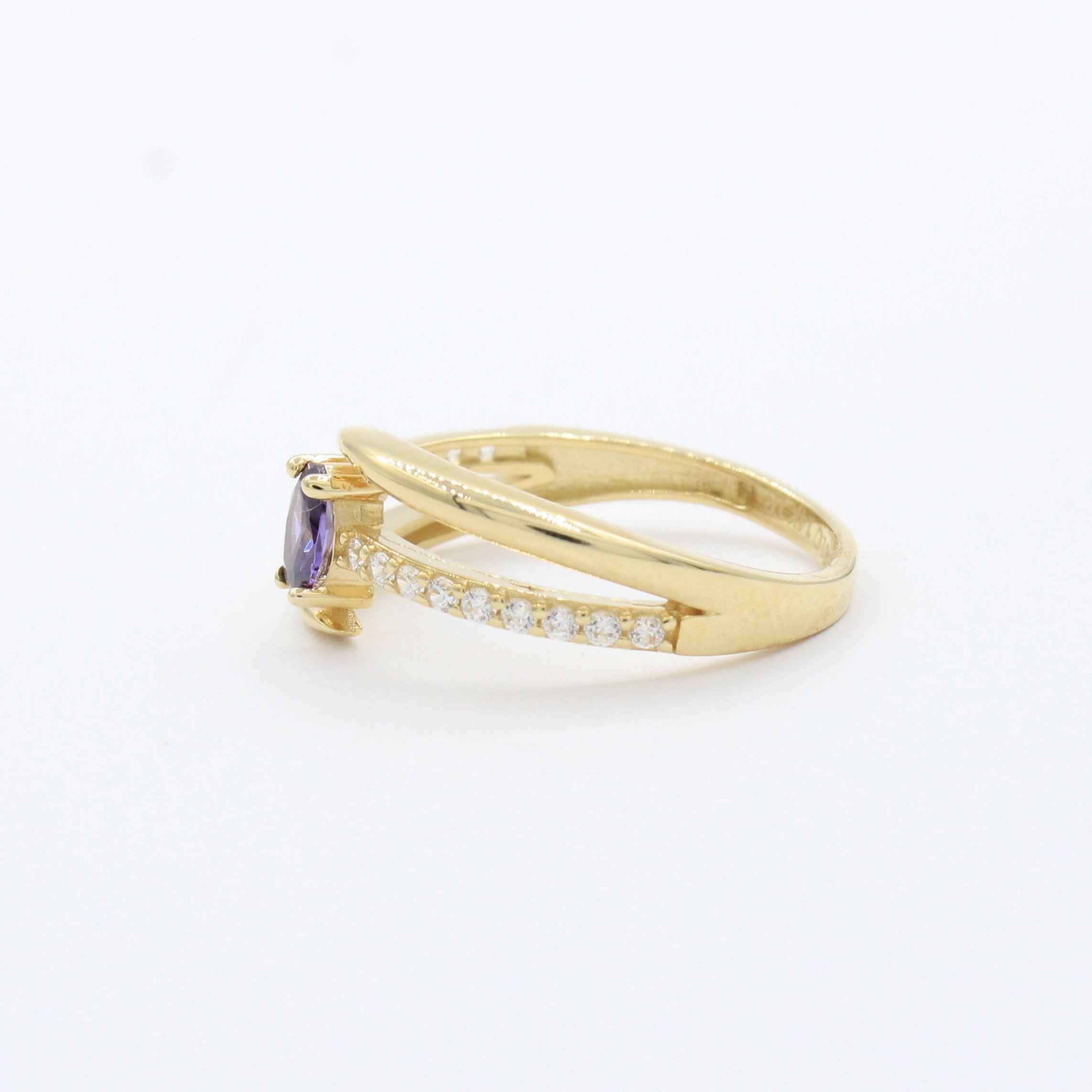 Anillo de Oro 14k Diseño Cruzado con Zirconia Morada Oval y Carril de Zirconias mod. 10388