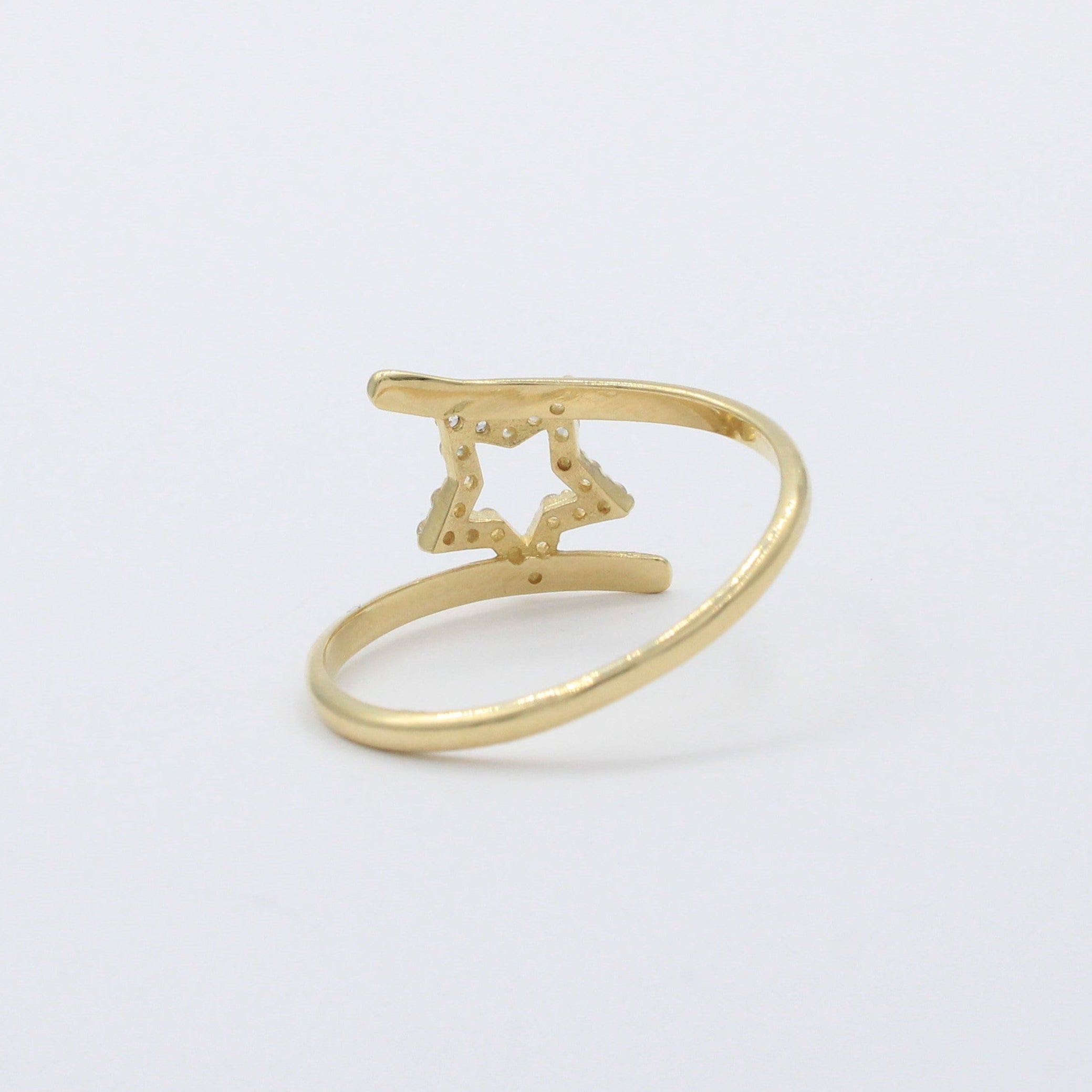 Anillo de Oro 14k Diseño Cruzado con Estrella Incrustado en Zirconias mod. 10393