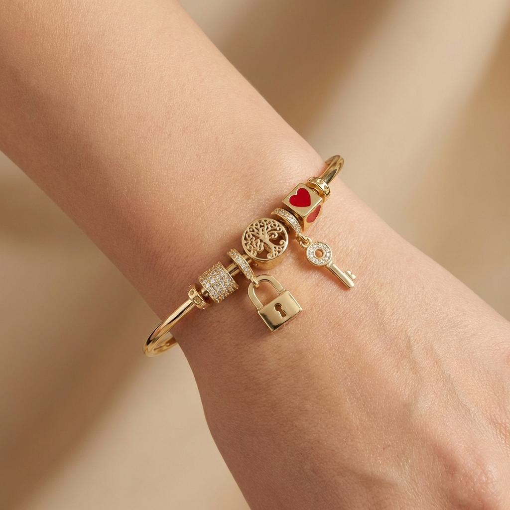 Pulsera de Oro 14k Diseño Tubular Hueco con Charms Brillantes Detallados con Zirconias mod. 10669