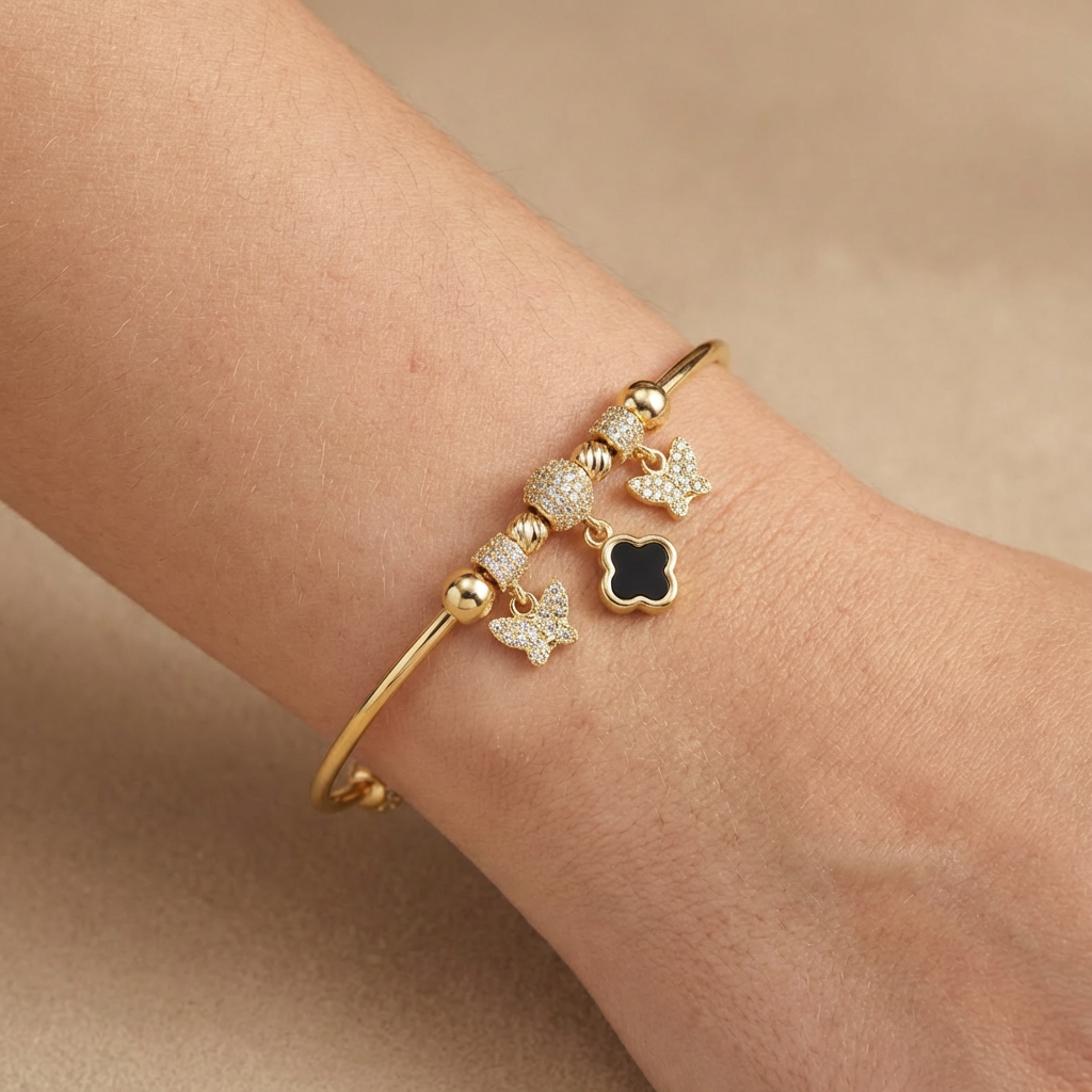 Pulsera de Oro 14k Tubular Hueca de Diseño Abierto Detallado con Trébol, Charms y Zirconias mod. 10668