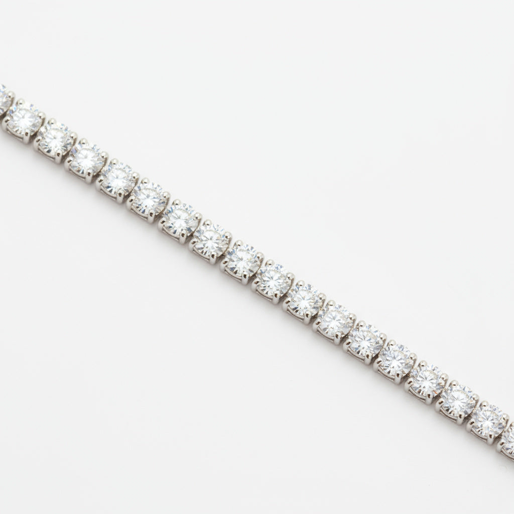 Pulsera de Oro Blanco 14k con Engaste de 4 Garras de Zirconias Redondas mod. 9996