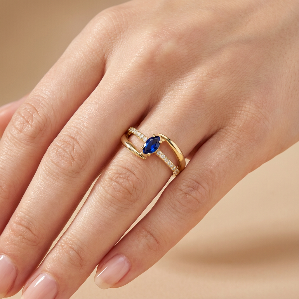 Anillo de Oro 14k Diseño Cruzado con Zirconia Azul Oval y Carril de Zirconias mod. 10390