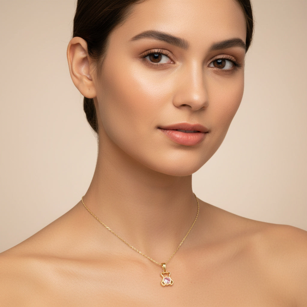 Dije de Oro 14k Osito con Corazón Rosa e Incrustado de Zirconias mod. 10085